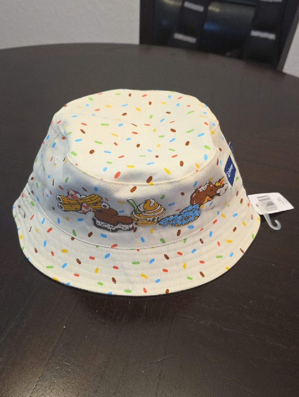 Official Disney Parks Cream Sprinkle Bucket Hat with Dessert Print